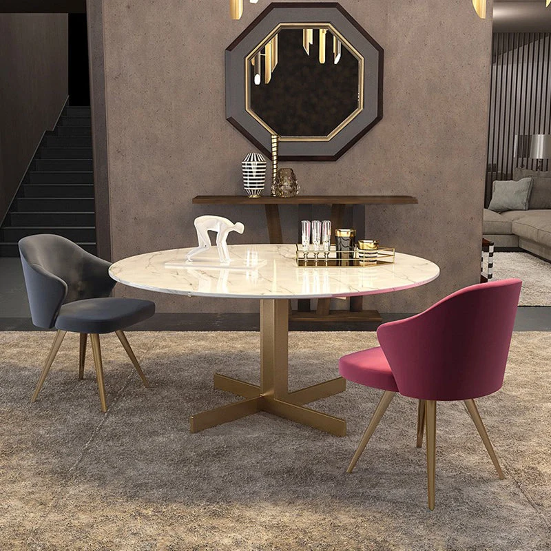 Tavolo da pranzo rotondo minimalista stile glam metallo e pietra per il soggiorno di casa Clearhalo