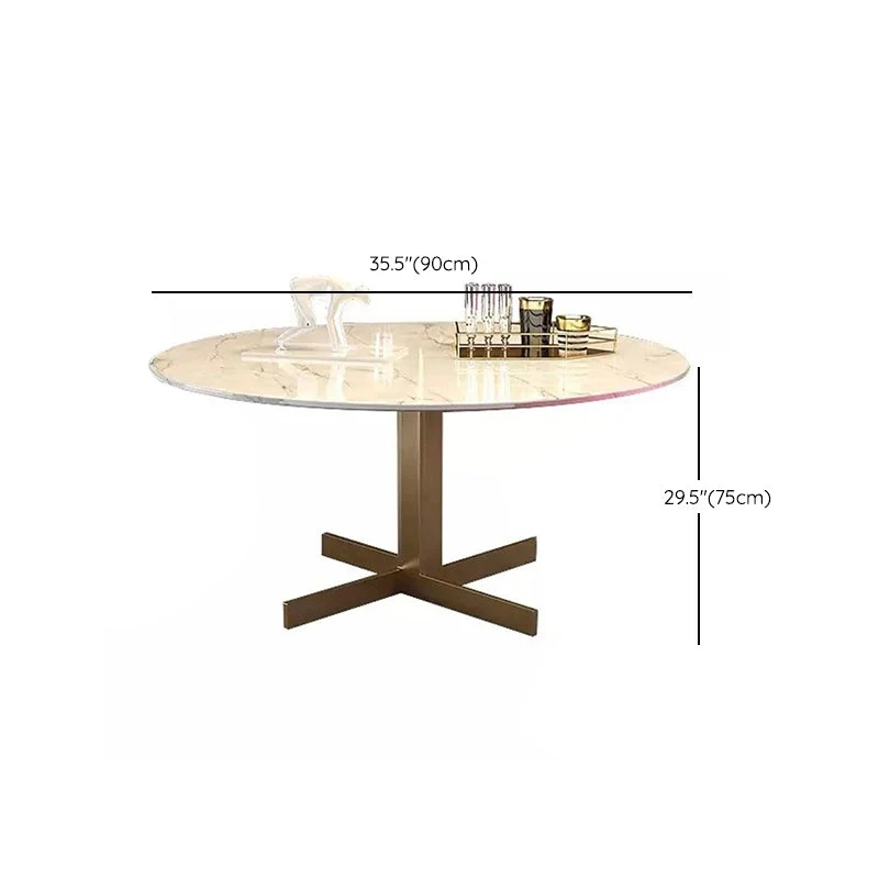Tavolo da pranzo rotondo minimalista stile glam metallo e pietra per il soggiorno di casa Clearhalo