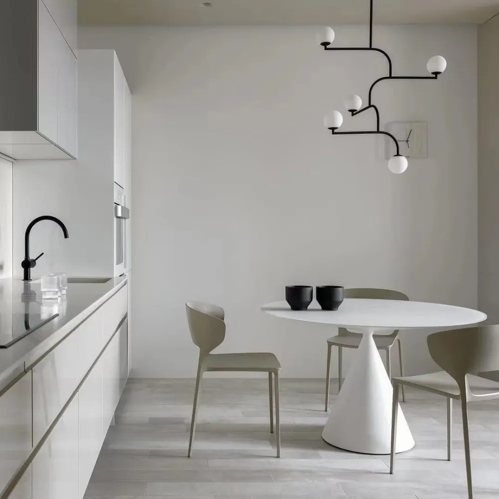 Tavolo da pranzo rotondo moderno Tavolo pietra sinterizzata con gamba metallo per uso domestico Clearhalo