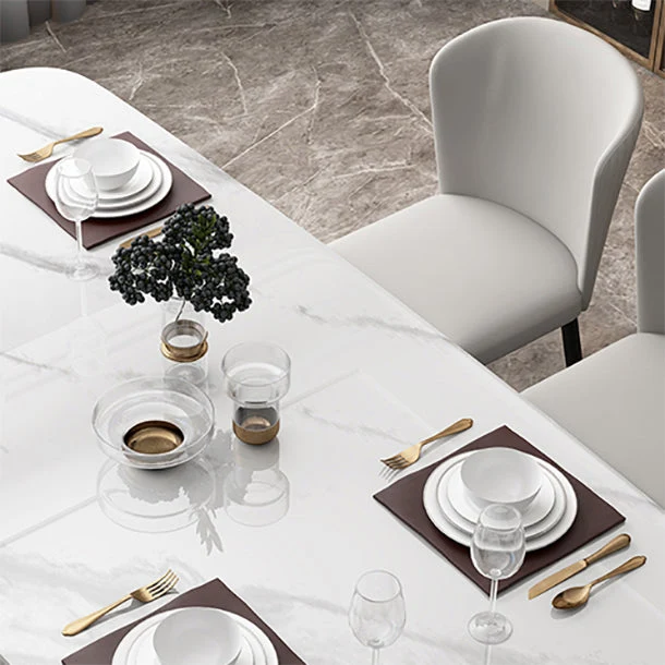 Tavolo rettangolare di lusso con piano pietra sinterizzata e base cavalletto oro Clearhalo