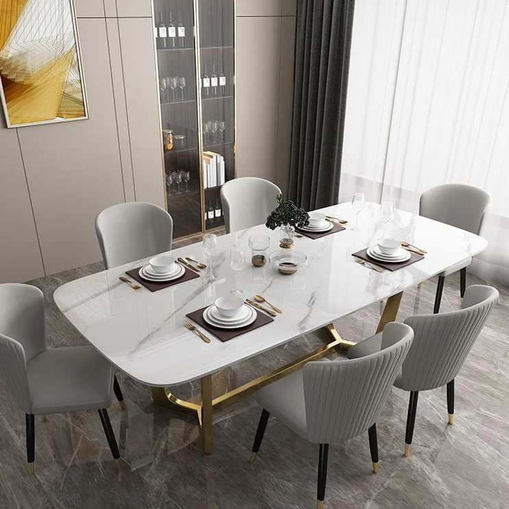 Tavolo rettangolare di lusso con piano pietra sinterizzata e base cavalletto oro Clearhalo