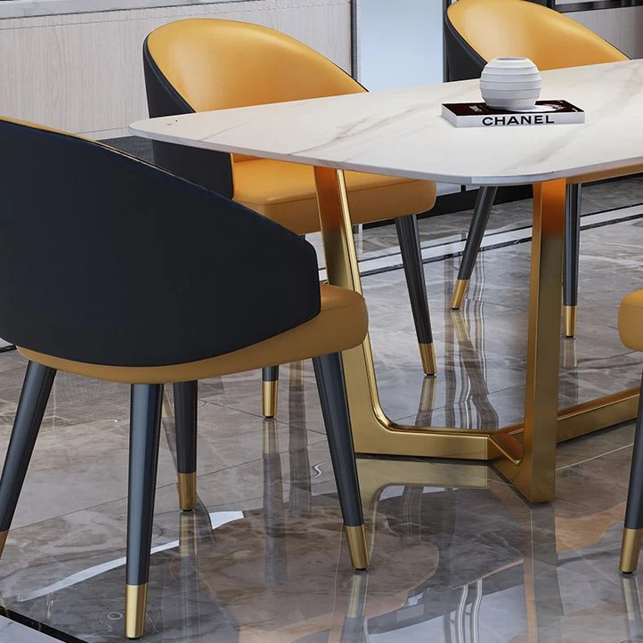 Tavolo rettangolare di lusso con piano pietra sinterizzata e base cavalletto oro Clearhalo