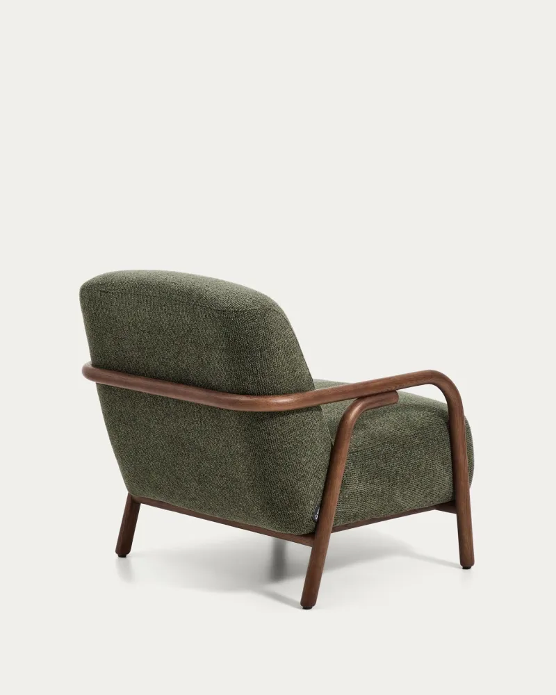 Poltrona Sylo realizzata ciniglia verde scuro e legno massello di frassino con finitura noce, FSC 100 %