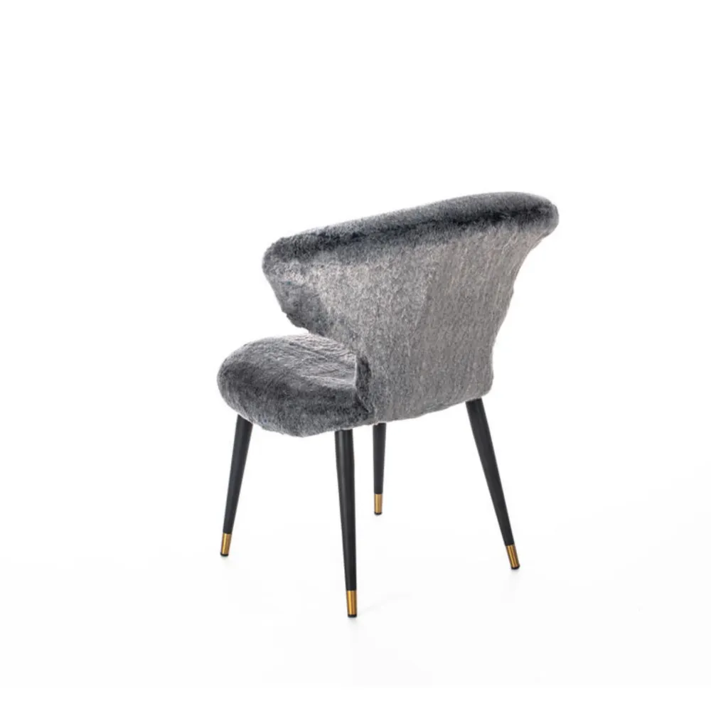 Poltrona imbottita pelliccia sintetica "Elena" con gambe metallo cm 66x64 87h Stones